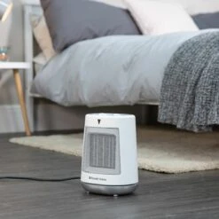 Russell Hobbs 2kW Oscillating Ceramic Electric Fan Heater in White 16 Russell Hobbs 2kW Oscillating Ceramic Electric Fan Heater in White -Deals Russell Hobbs Store rhfh1008 lifestyle 5s